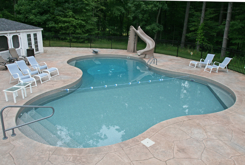 Swimming pool and stamped concrete project example 16